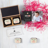 Stack of 10 boxes of 1st birthday party invitations ready for dispatch