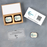Branded wooden gift box with assorted logo chocolates as premium expo giveaway gift.