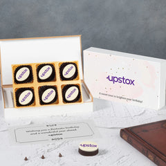 White corporate birthday gift box with six oval logo chocolates and printed birthday greeting