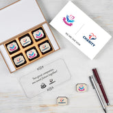 Branded black wooden box with company logo, ideal for announcing a merger to clients.