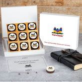 Open wooden gift box revealing branded chocolates and thank‑you note for suppliers