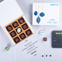 Custom 9-chocolate box designed as thoughtful corporate employee Christmas gifts