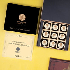 Angled shot of 9‑piece logo chocolate box showcasing brand impression after meeting