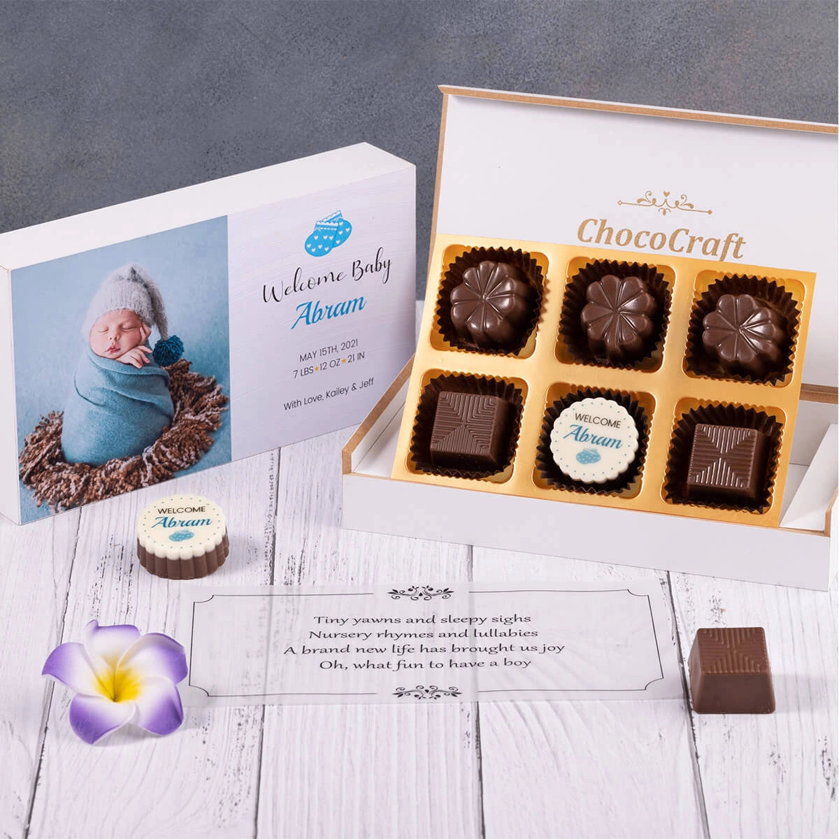 Customized baby arrival message inside gift box with printed chocolate