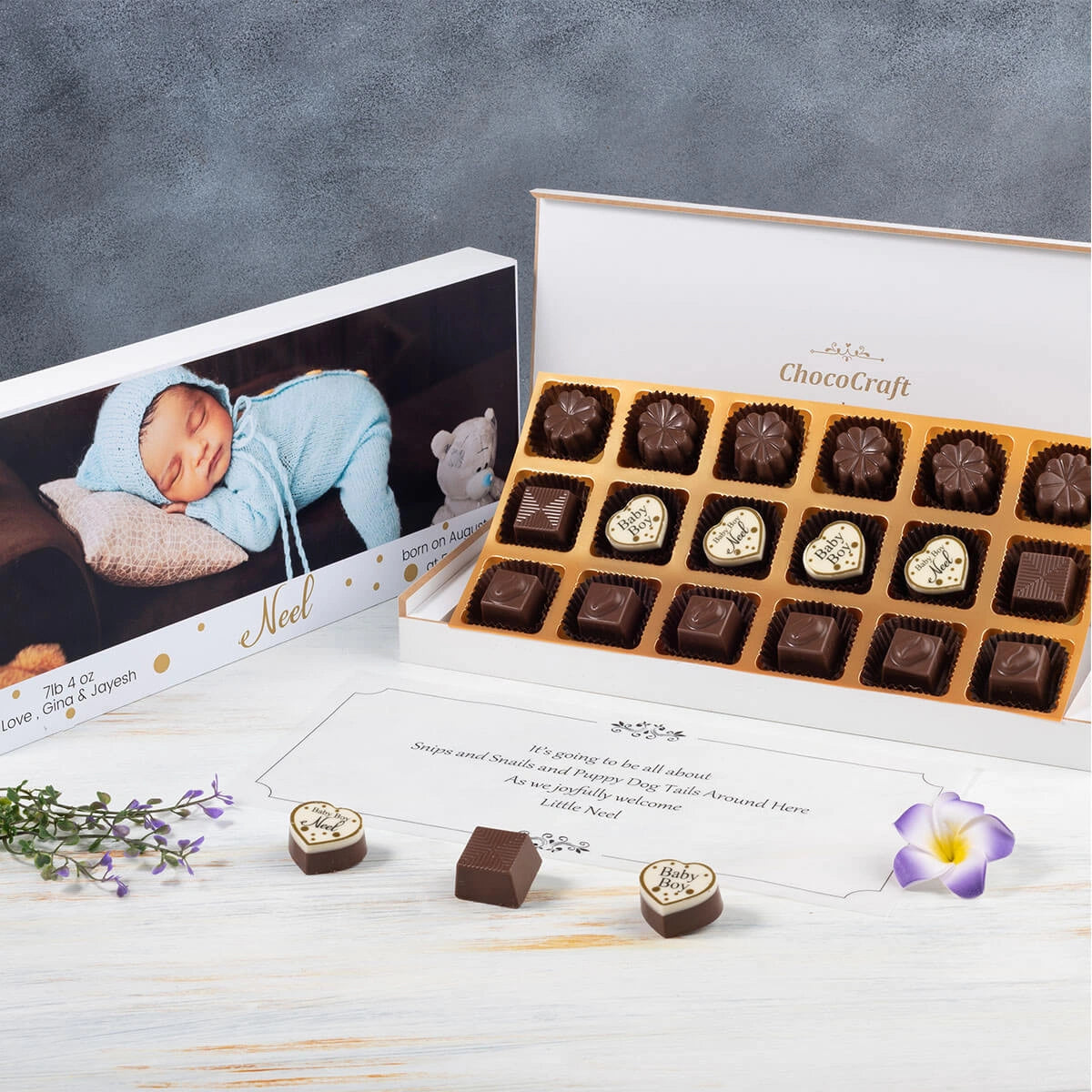 Four center chocolates printed with baby photo and name