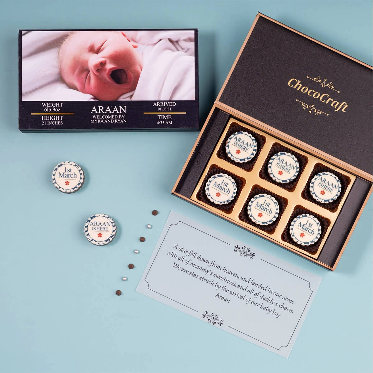 Open view of chocolate box with custom prints – elegant birth announcement gift