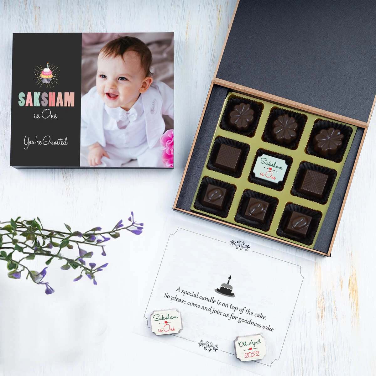 Close-up of printed chocolate for birthday invitation card for 1st year