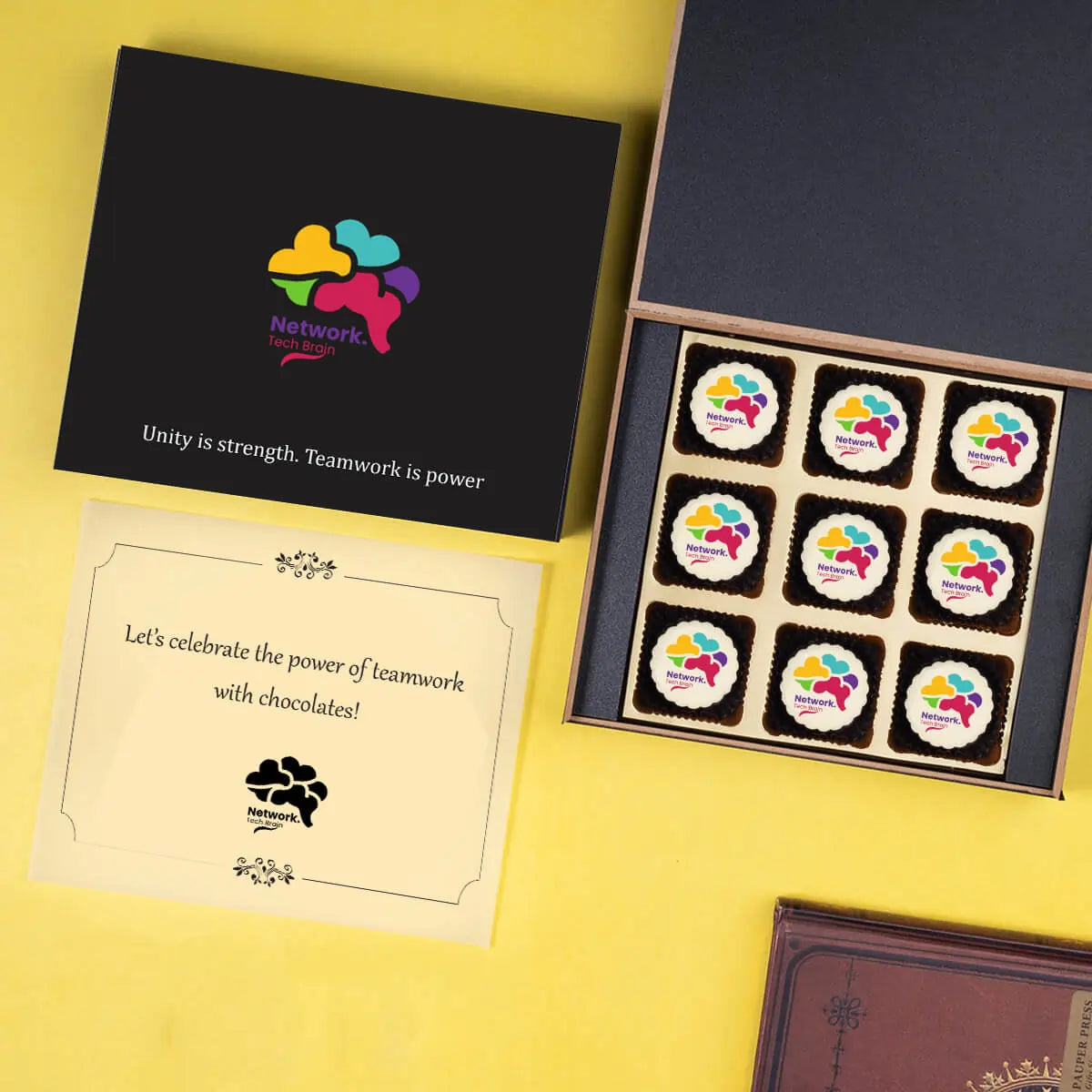 Box and chocolates arrangement with company logo — employee appreciation gift