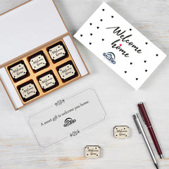 Branded black box filled with logo chocolates given to buyers after signing property papers