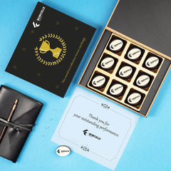 Sleek black wooden award gift box containing logo chocolates