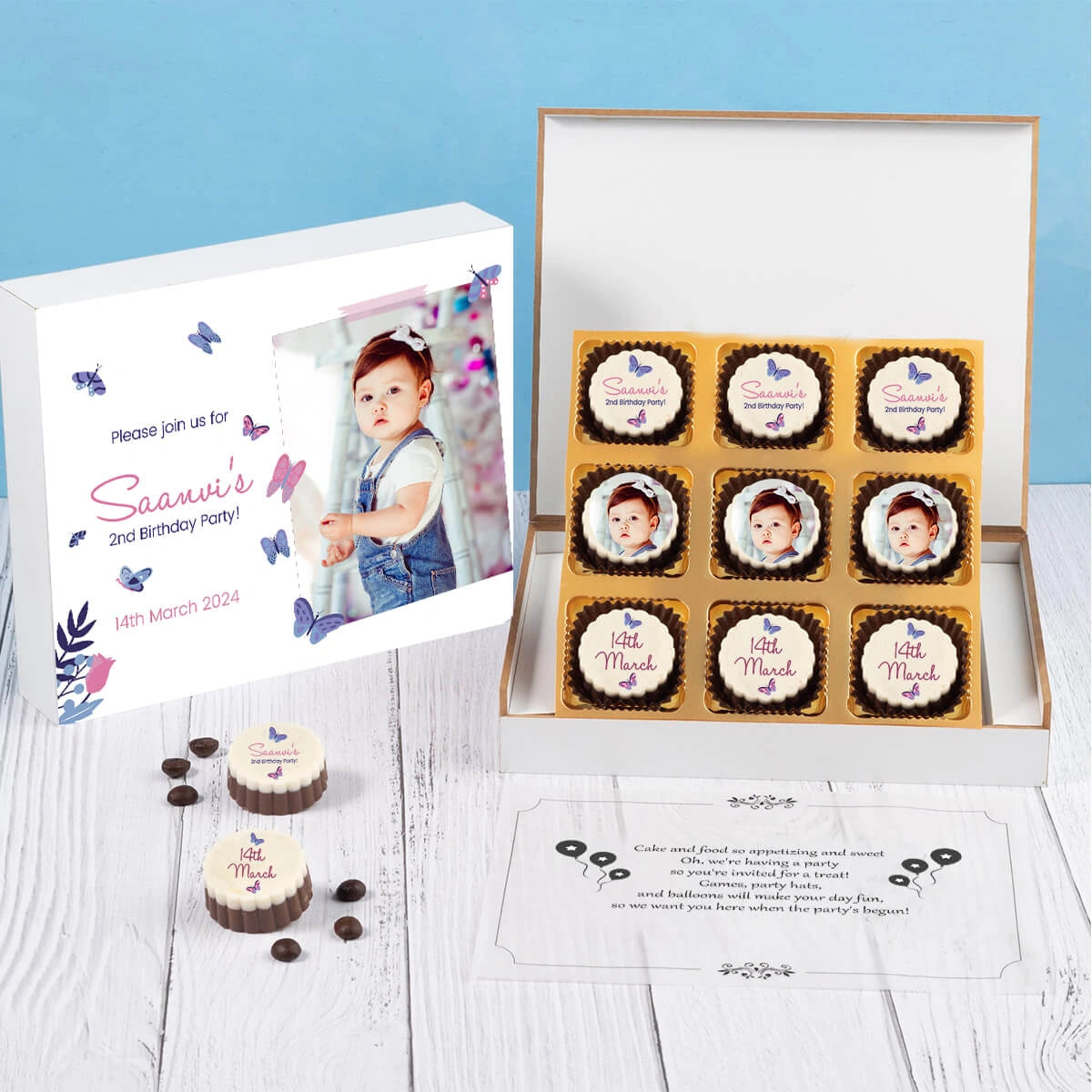 Custom birthday party invitations featured on printed chocolates in a wooden box