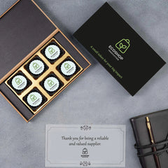 Six‑piece festival gift set with logo chocolates and personalised message for suppliers