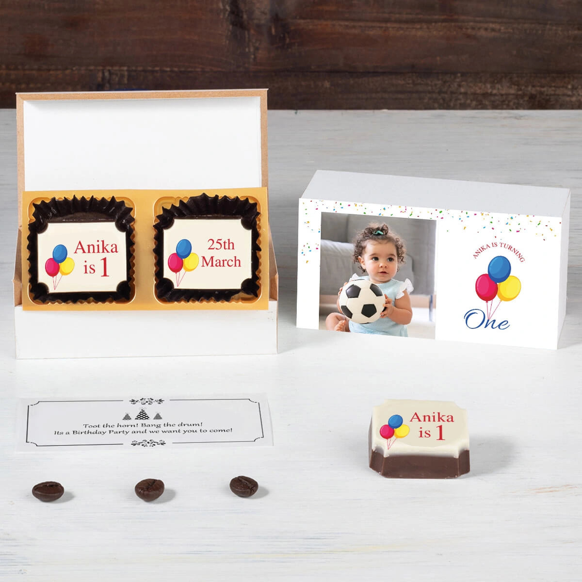 Online design preview of first birthday invitations printed on chocolates
