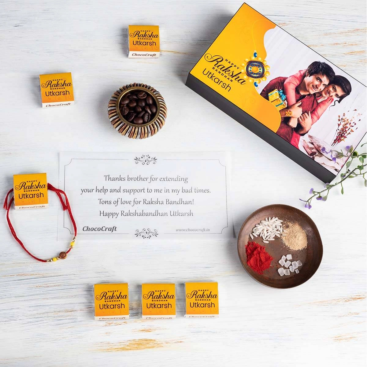 Flat-lay of festive rakhi special gift elements