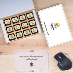 White wooden gift box showing four custom chocolates and appreciation card insert.
