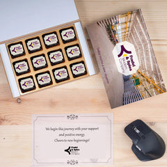 Open wooden gift box showing logo chocolates for factory 