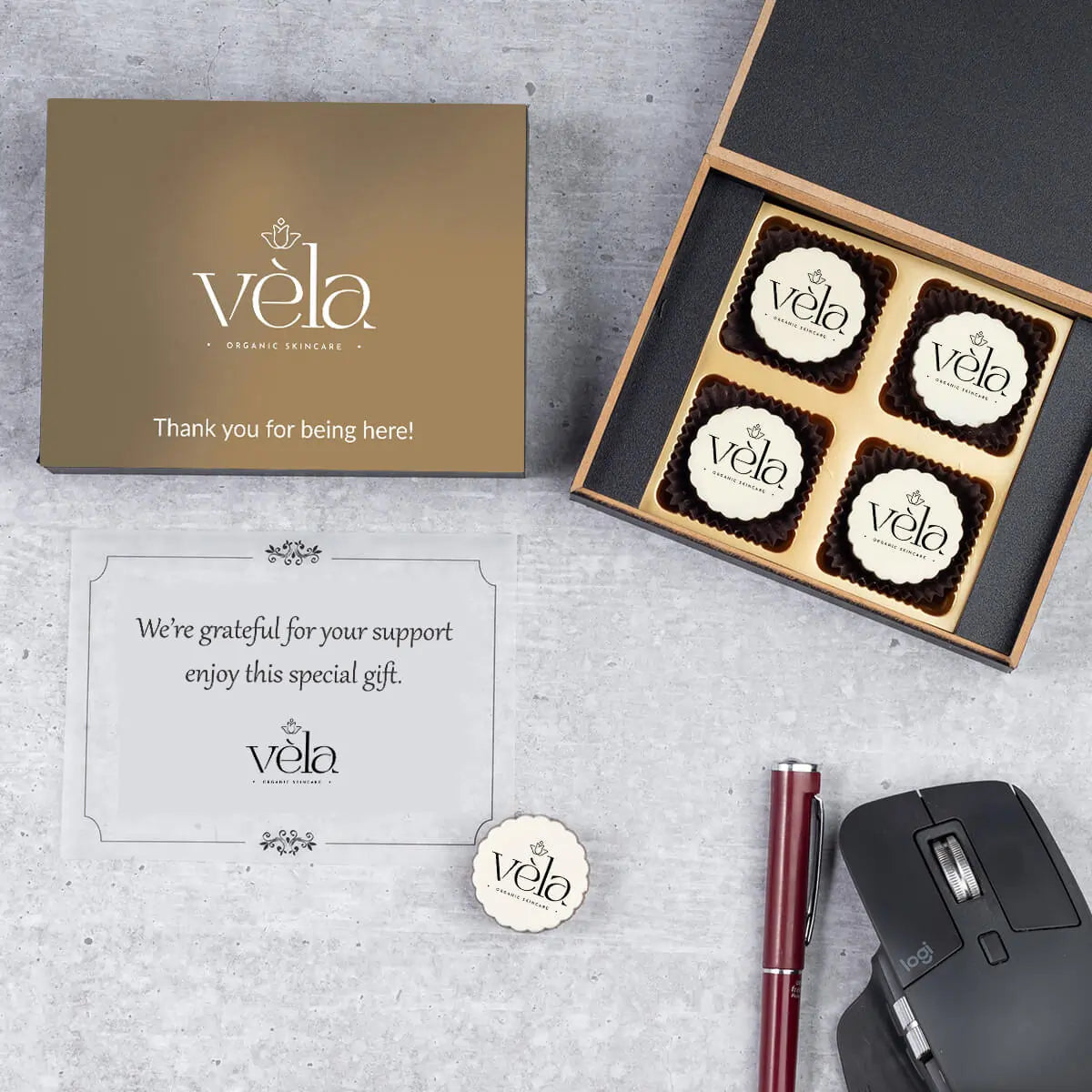 Gift box open showing personalized butter-paper message insert