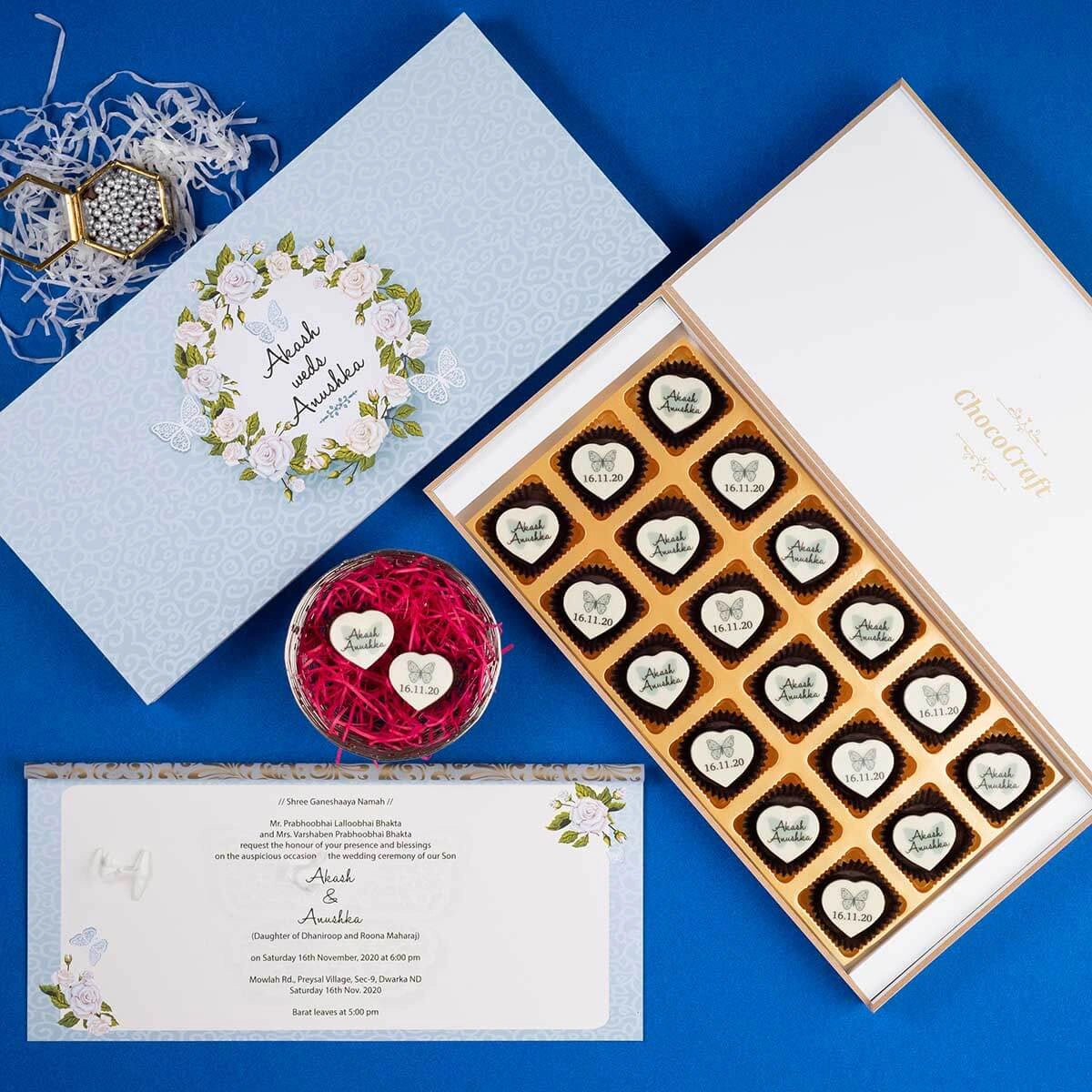 Elegant 18-piece chocolate box wedding invitation in luxury packaging