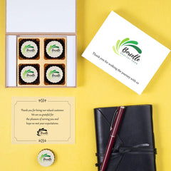 Black MDF gift box with printed message & chocolates thanking top distributors.
