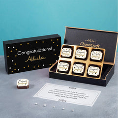 Personalized congratulations card featuring wrappers