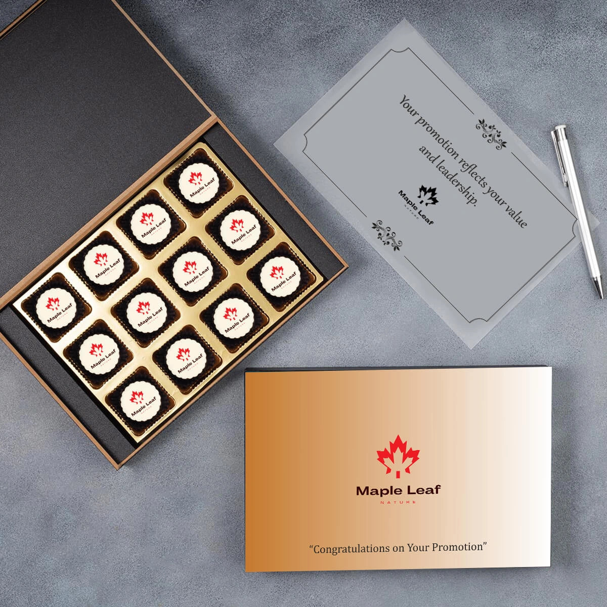 Twelve‑piece personalised promotion gift box featuring logo chocolates and employee name