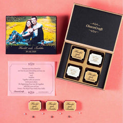 Open chocolate box with printed chocolates – elegant reception invite idea