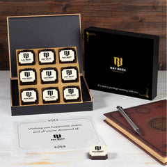 Nine‑piece corporate retirement gift box with ogo chocolate.