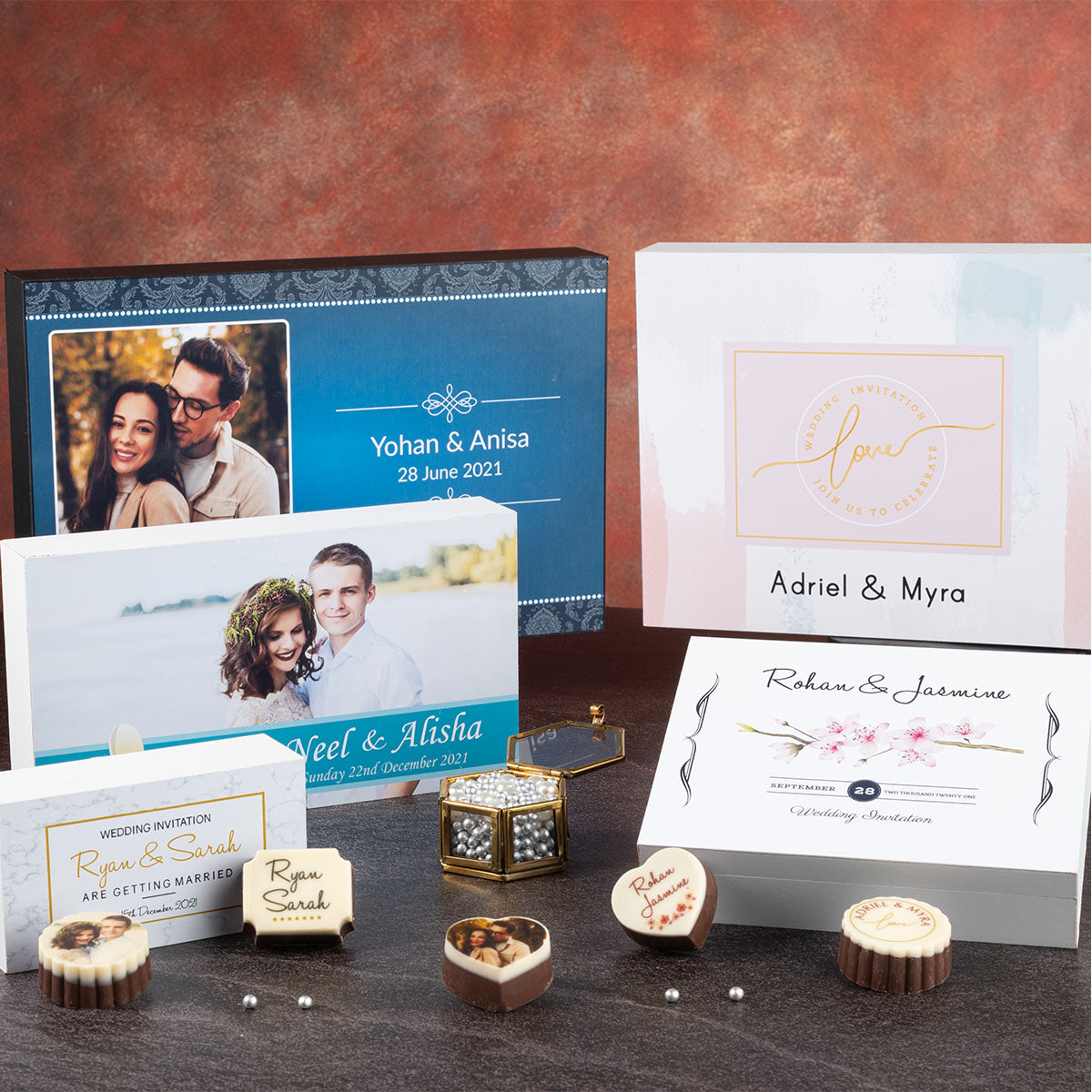 Wedding invitation box with printed chocolates and personalized butter paper message