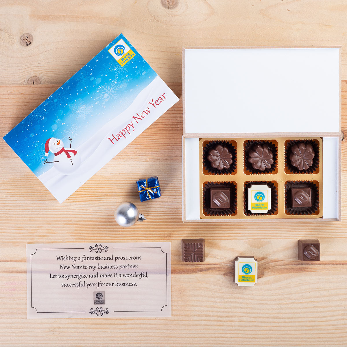 Close-up of edible logo printing on chocolates—hallmark of great corporate Christmas gifts