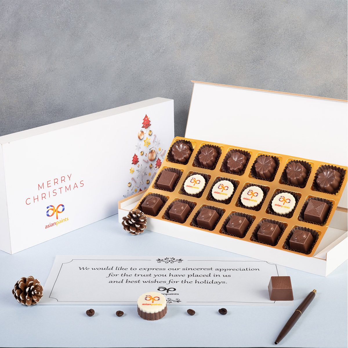 Festive branding on chocolates and box—memorable unique corporate Christmas gifts idea